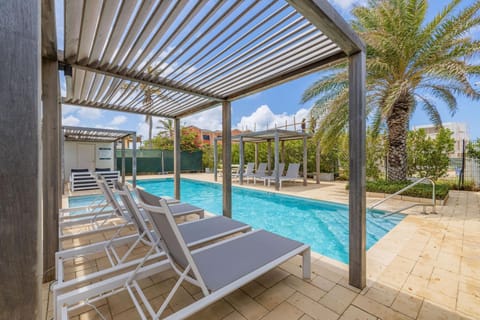 Swim in the community pool while relaxing in this beautiful shared space!