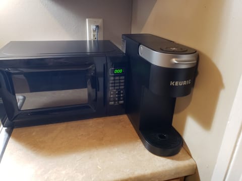 Microwave and Keurig coffee maker