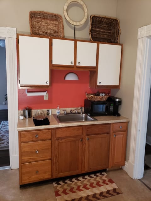Fully equipped kitchen with Keurig, dishes, silverware, pots & pans, bakeware