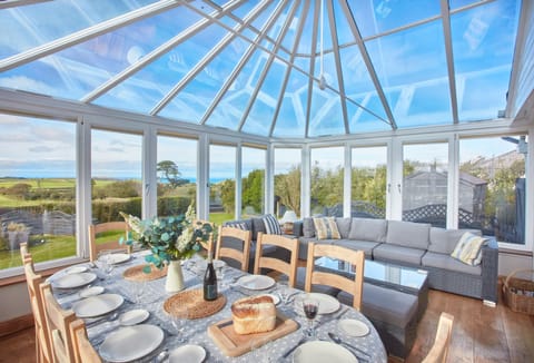Little Seawynds, Trelights. Ground floor: Conservatory with views overlooking the garden and distant sea views