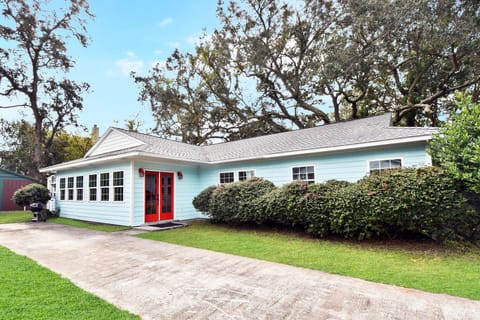 East Beach Cottage Four Houses from Beach - Red-door exterior at Jack's Place, four houses from the East Beach sand with driveway parking at the house.