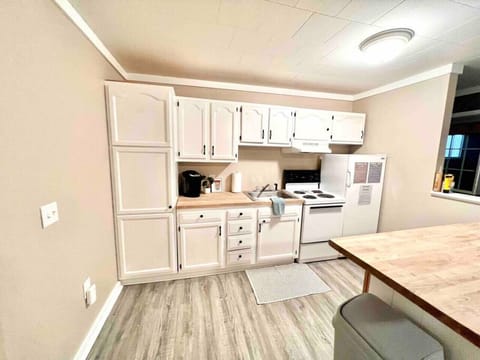 Guest suite: stocked kitchen with basic cooking essentials and keurig with complimentary coffee/tea.