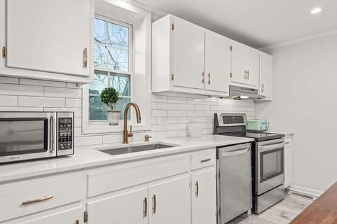 Sunlit kitchen with designer finishes