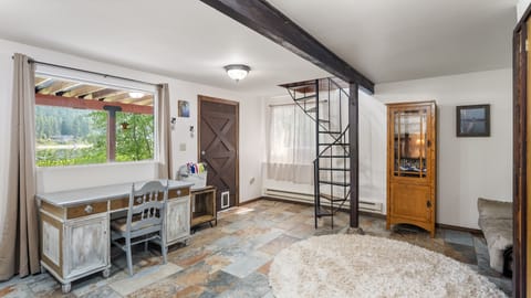 The downstairs suite has an exit right out on the covered patio with the hot tub