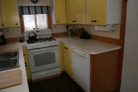 Stove, dishwasher, refrigerator, and microwave.