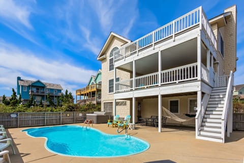 One of the standout features of this exquisite vacation home in the 12' x 29' Private Pool!