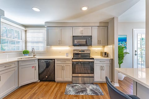 Updated, fully equipped kitchen includes a Coffee Maker and a Keurig.