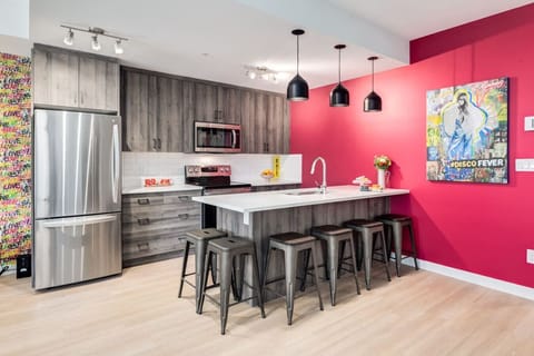 Large kitchen island seats up to 6 people.