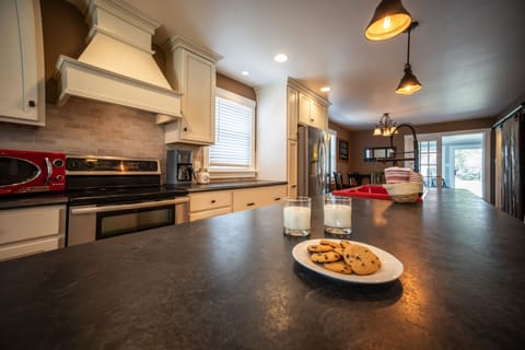 The high top counter stools seats 6 at this 11 foot island.