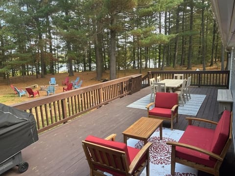 Spacious backyard with deck and firepit. Lots of seating!