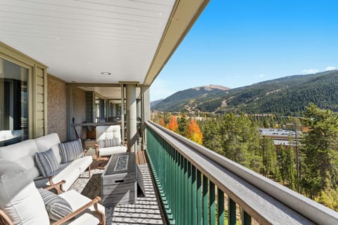 Spacious private balcony with outdoor seating. Please note the fire pit is not available for use.