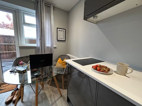 View of dining area/workspace setup.