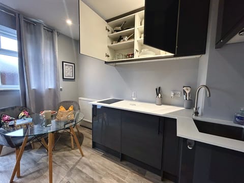 View of dining area/workspace setup.