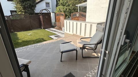 Private backyard with terrace and seating options