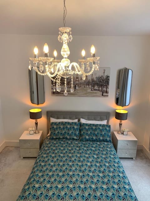 The sofabed and single bed are in the living room.