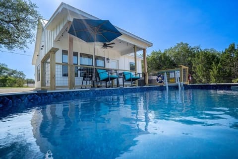 View from the pool looking at the back of home