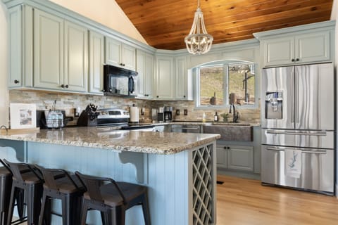 Full kitchen with stainless steel appliances