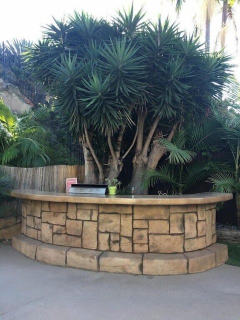 Outdoor kitchen complete with refrigerator