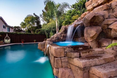 Built in jacuzzi, waterslide and waterfalls.