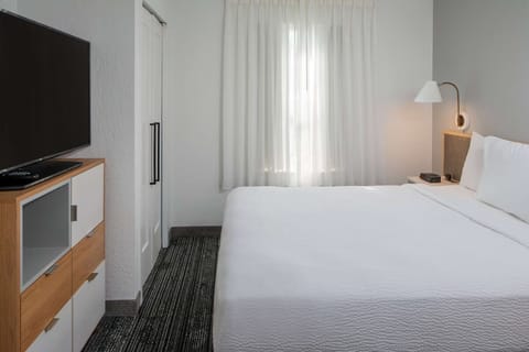 Wake up to gentle daylight filtering through sheer, calming curtains