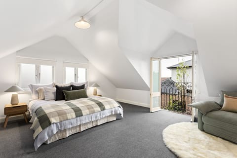 Huge upstairs room with King bed that can be altered to two king twin beds.