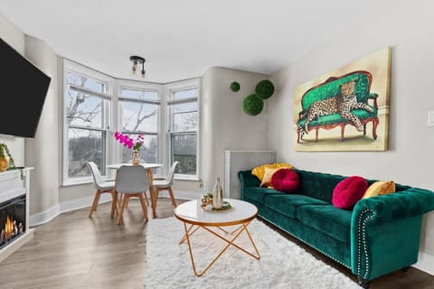 The comfortable and cozy living area has lots of natural light! Relax while reading, visiting or watching tv!