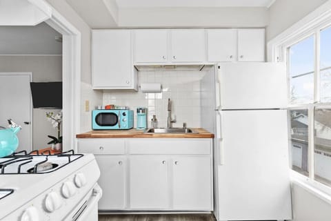 All the necessities for your morning brew are provided including a Keurig and a starter pack of k-cups, tea, creamer, sugar and stevia.