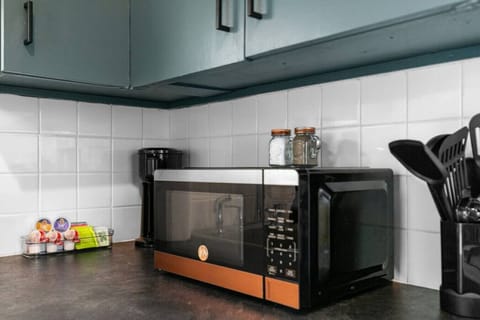 All the necessities for your morning brew are provided including a Keurig and a starter pack of k-cups, tea, creamer, sugar and stevia.