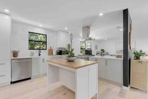 chef's dream kitchen with new Kitchenaid appliances, including gas range