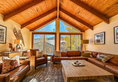 Adorned with mountain decor and art, the room exudes a warm and inviting ambiance.