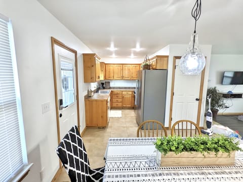 Eating in is no problem with this standard galley kitchen stocked with all your basic needs.