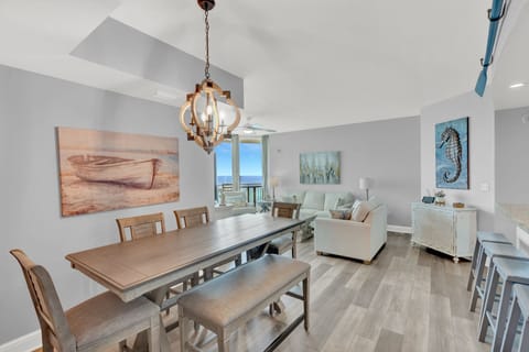 Gulf Front Dining! This beautifully remodeled and decorated home features stunning views of the Gulf of Mexico and Panama City Beach through floor to ceiling windows.