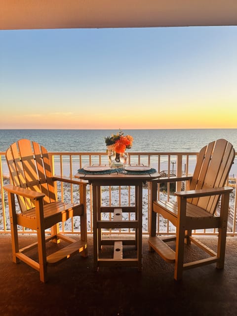 Beautiful gulf front balcony with comfortable furniture