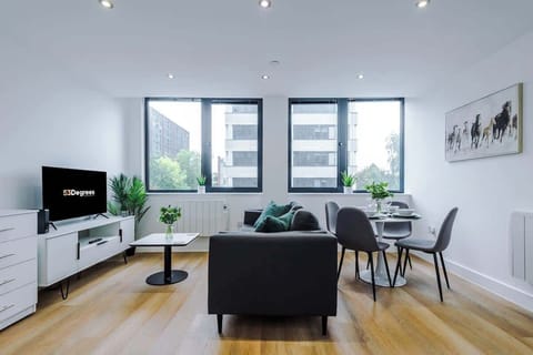 The open-plan living room, dining area and kitchen benefit from a comfortable sofa and 40-inch SMART TV.