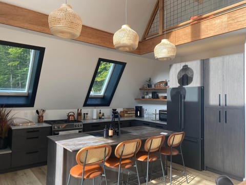 Fully stocked kitchen with breakfast nook and island