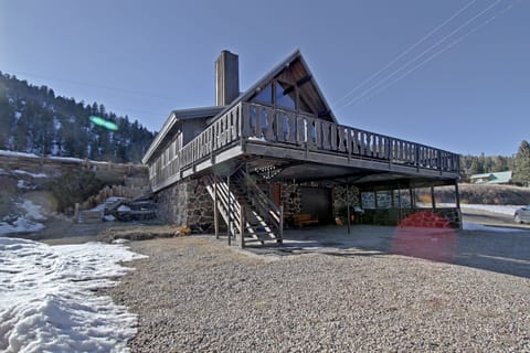 Huge deck has a hot tub, large picnic table & space for all.