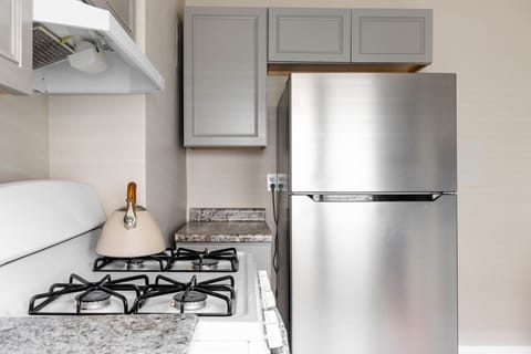 Prepare your favorite dishes in this fully equipped kitchen, furnished with all essential cooking utensils