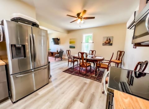 The kitchen is open to the dining room to easily serve food or visit