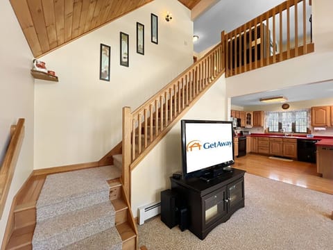 Living room with large screen TV.