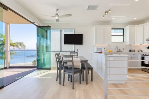 Additional TV near the dining area.