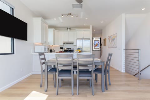 Four chairs and bench seating at the interior dining table.