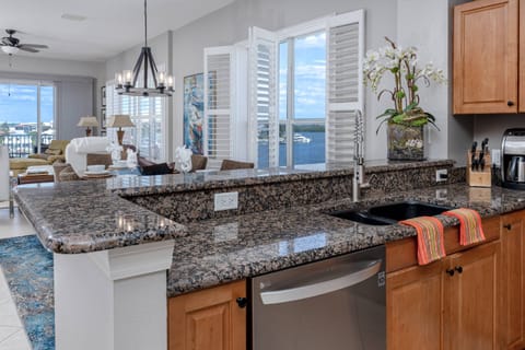 Kitchen Breakfast Bar Opens to the Rest of the Main Living and Dining Space