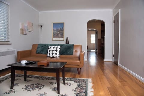 Living room with fold down sofa and HD TV.