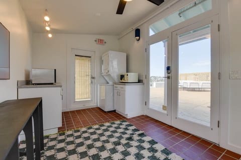 Galley kitchen - stackable washer/dryer, microwave & toaster oven.