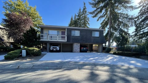 Front of building, carport and parking