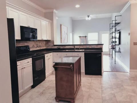 Large updated kitchen with all appliances and well equipped with Kitchen island.