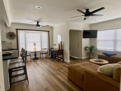 Living room and kitchen and common area with conversational seating