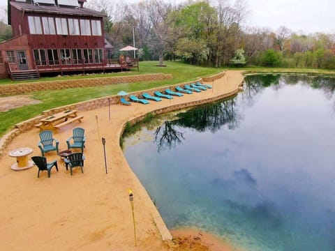 Ariel view of beach with seating next to pond