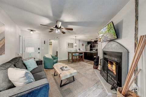 Open plan living area looking back to kitchen