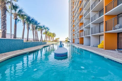 Relax by the meandering lazy river and soak up the sun, surrounded by the tranquility of palm trees and ocean breezes.